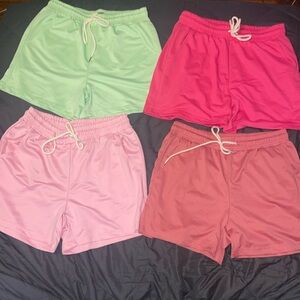 Lot of 4 New colorful comfortable shorts size small.